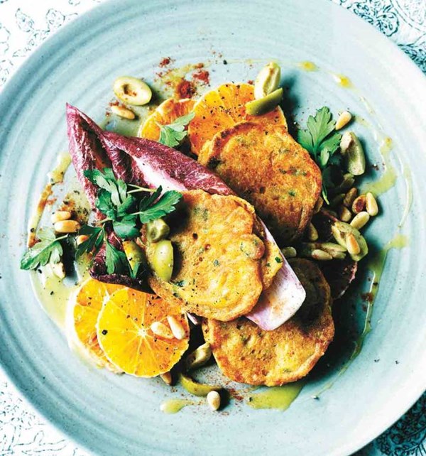 Manchego fritters with chicory, orange and olives and a Seville orange dressing