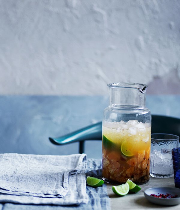 Mandarin and pink peppercorn caipirinha