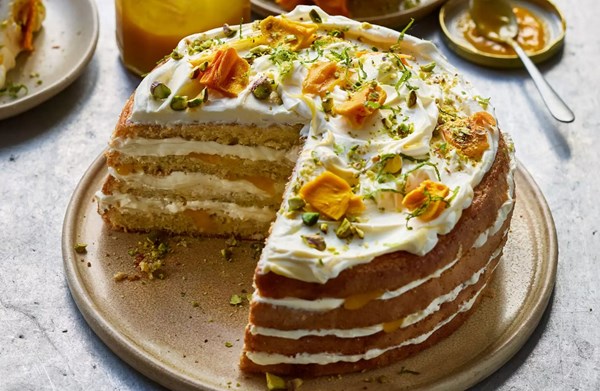 Mango & passion fruit layer cake with lime and pistachio