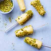 Mango and cardamom kulfi pops with pistachios