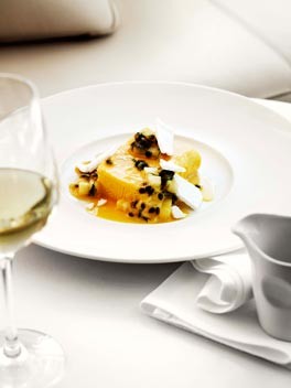 Mango and yoghurt parfait with passionfruit and pineapple salad