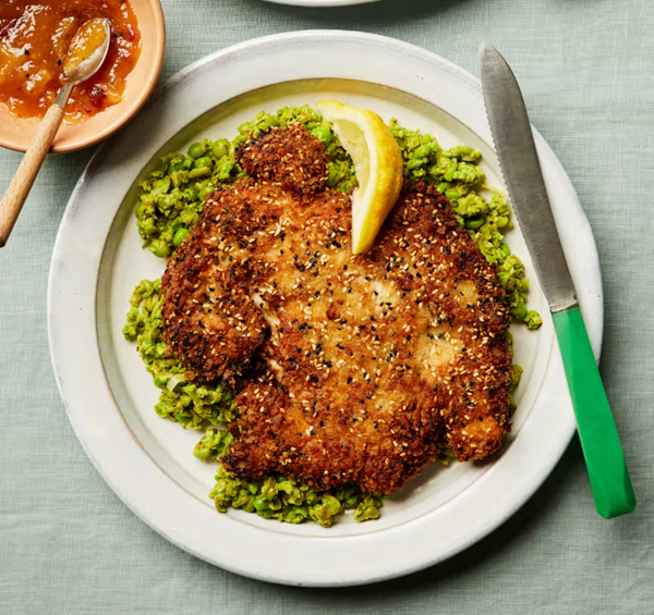 Mango chicken schnitzel with lime-leaf smashed peas