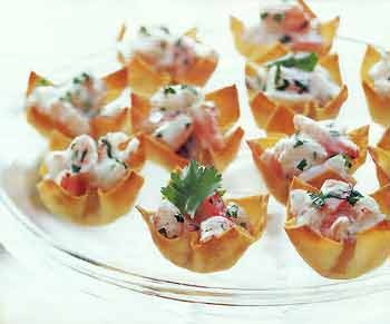 Mango-curry shrimp salad in wonton cups