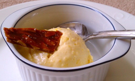 Mango honey frozen yogurt with brown butter almond brittle