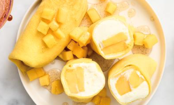 Mango pancakes with vanilla syrup