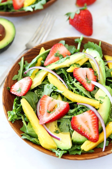 Mango, strawberry, and avocado arugula salad