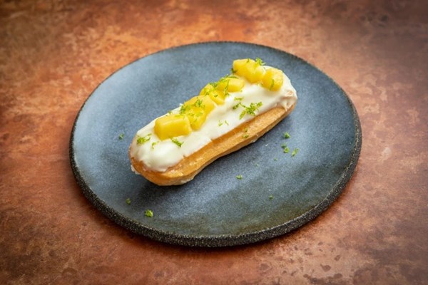 Mango, white chocolate and makrut lime leaf cream éclairs