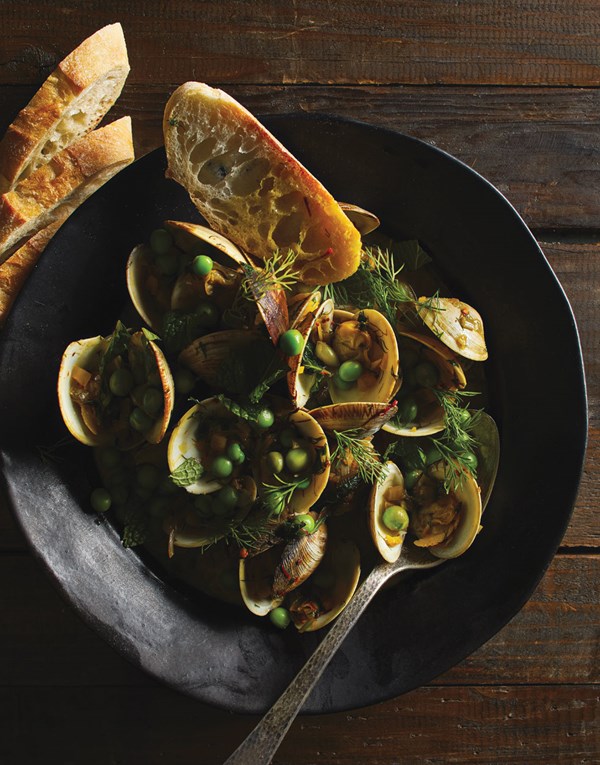 Manila clams with peas and green garlic