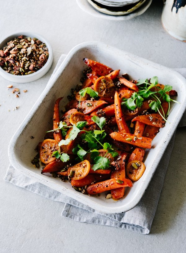 Maple and paprika roasted carrots with honey roasted spiced nut crumble