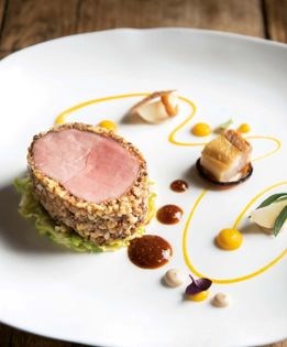 Maple-brined Berkshire pork tenderloin with butternut squash puree, walnuts, and mustard-curry jus