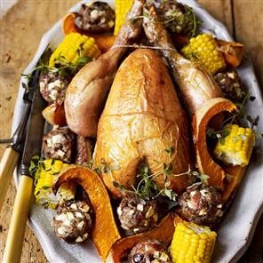 Maple-glazed roast chicken with chestnut and apple stuffing balls