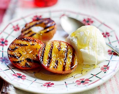 Maple grilled peaches with frozen yoghurt