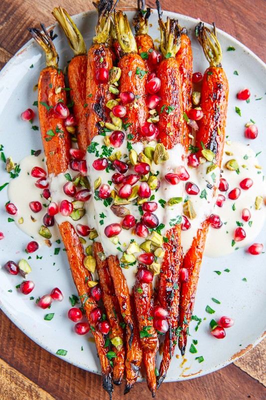 Maple roasted carrots in tahini sauce with pomegranate and pistachios