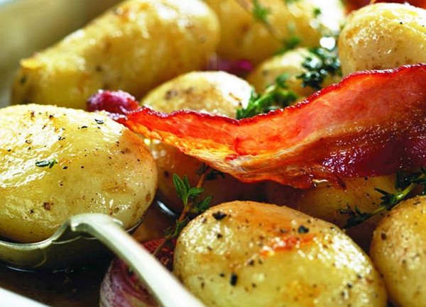Maple syrup glazed new potato salad with crispy Pancetta and squid