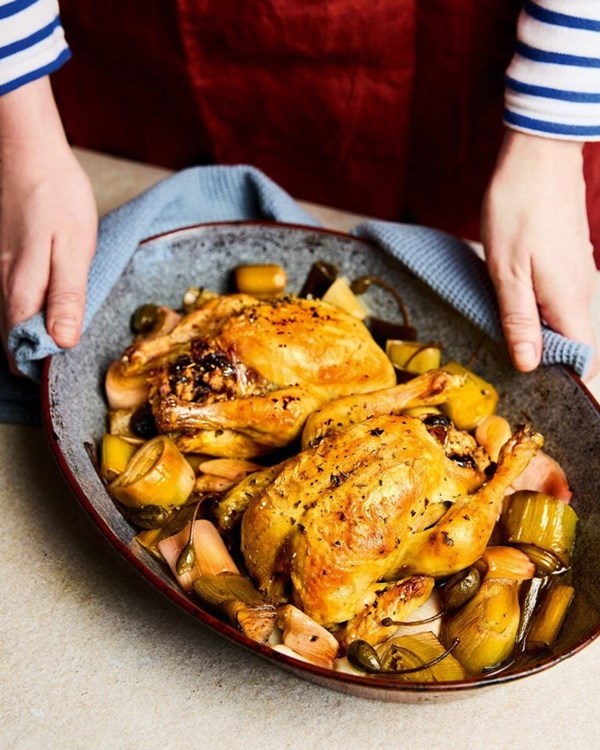 Marbella-stuffed poussins on sherry-braised leeks