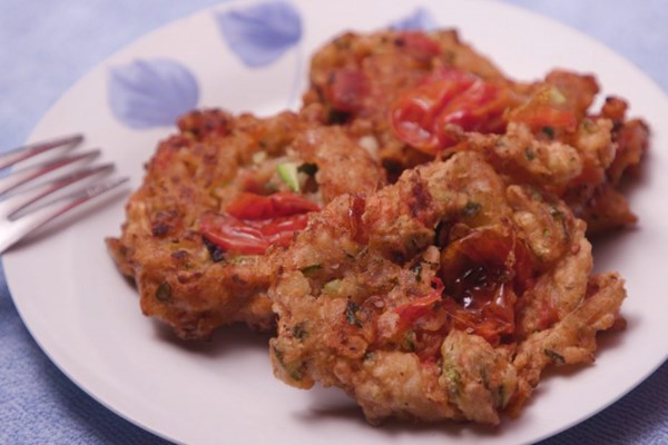 Margarita's tomato fritters with cod (Tomatokeftedes Santorinis me mpakaliaro)