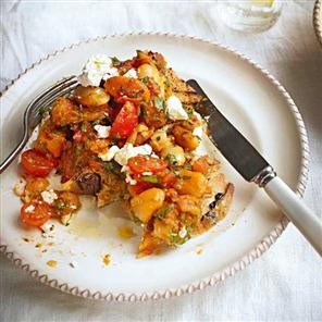 Maria Elia's beans (gigantes) plaki on toast with cherry tomatoes, feta and mint