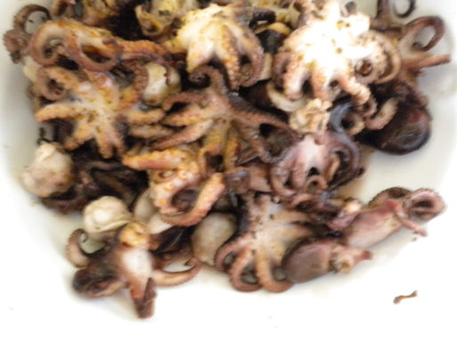 Marinated and grilled baby octopus