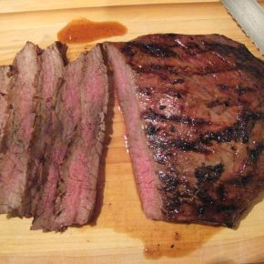Marinated and grilled or broiled flank steak