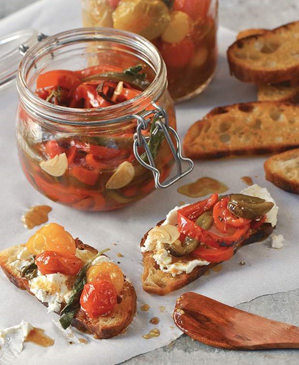 Marinated basil and garlic peppers on goat cheese tartines