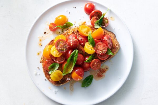 Marinated cherry tomatoes on toast