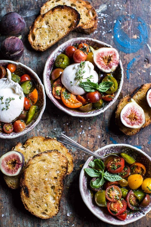 Marinated cherry tomatoes with burrata + toast