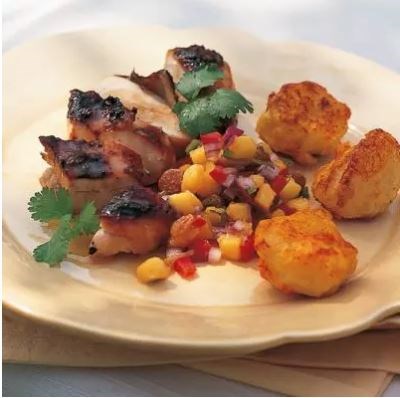 Marinated chicken with honey and ginger served with mango and sultana salsa
