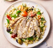 Marinated chicken with orzo, tomato & feta