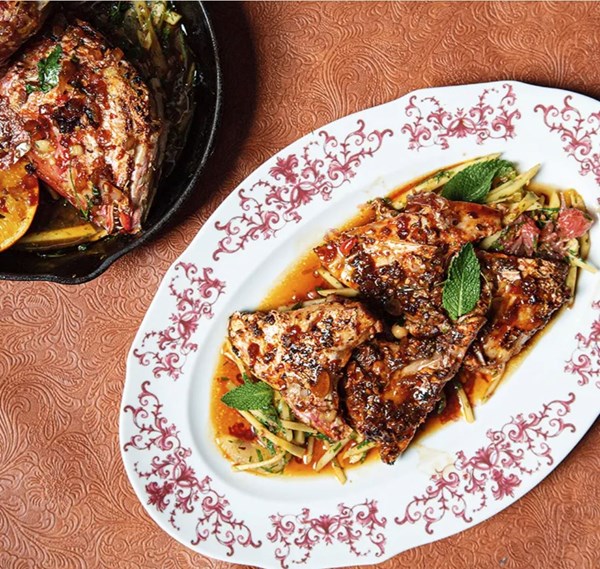 Marinated croaker collars with citrus and green mango salad