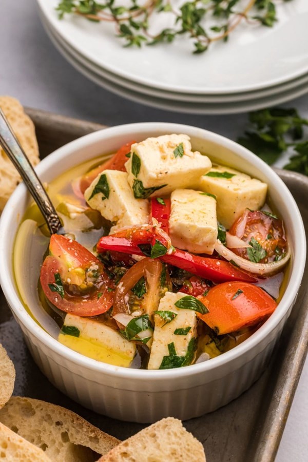Marinated feta with cherry tomatoes