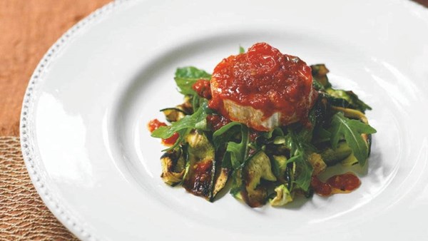 Marinated goat's cheese in fresh salsa rossa with marinated zucchini