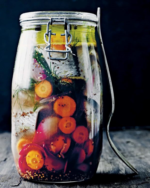 Marinated herrings with carrots and onions