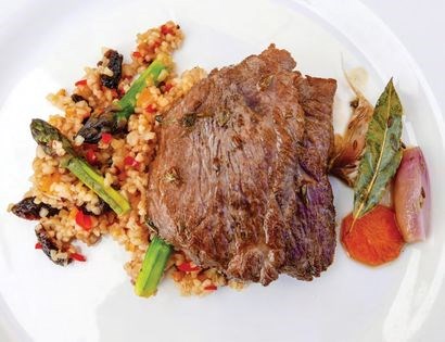 Marinated Iberian pork with raisin couscous (Presa Ibérica en escabeche con cuscus de pasas)