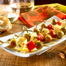 Marinated olive and cheese skewers