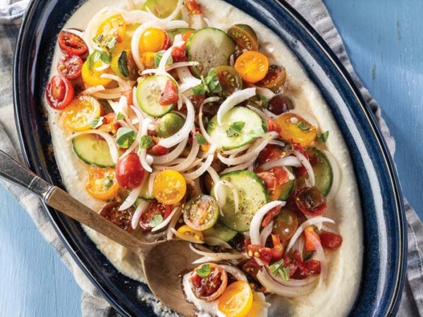 Marinated tomato and cucumber salad with whipped feta