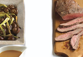 Marinated tri-tip with Chinese mustard sauce and roasted green onions and mushrooms