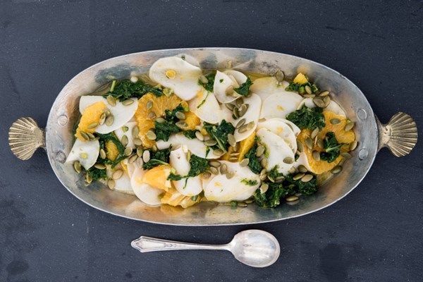 Marinated turnips with orange and pumpkin seeds