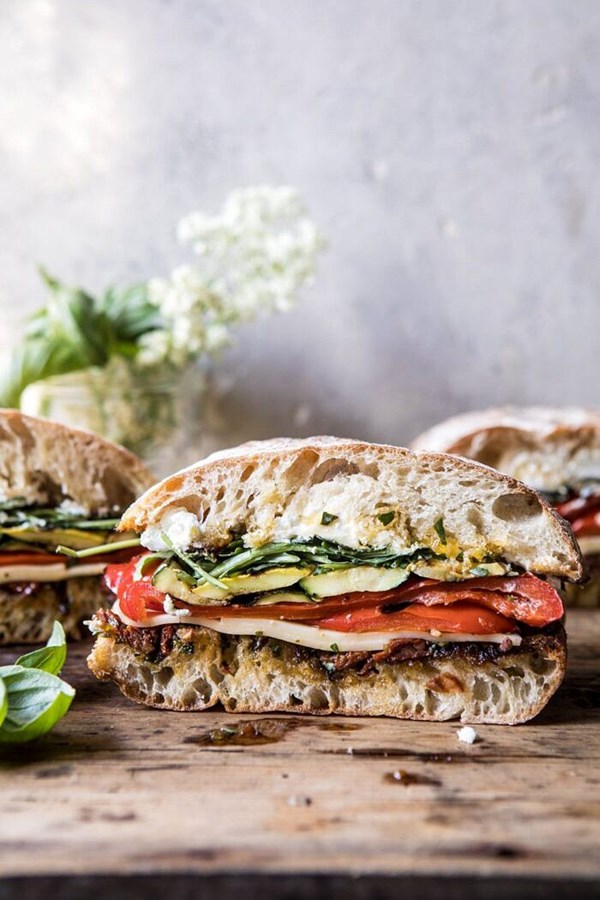 Marinated vegetable and cheese sandwich with sun-dried tomato pesto