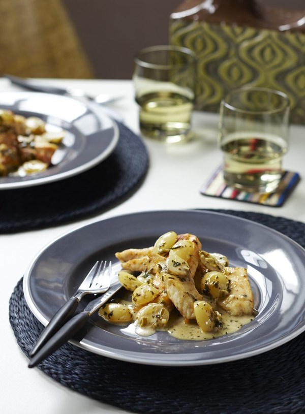 Market fish with white wine, grapes and tarragon