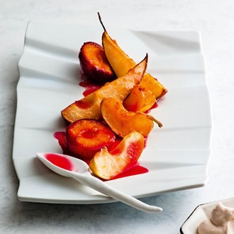 Marmalade-baked fruit with orange cream