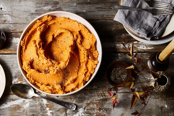 Mashed sweet potatoes with crème fraîche and herbs