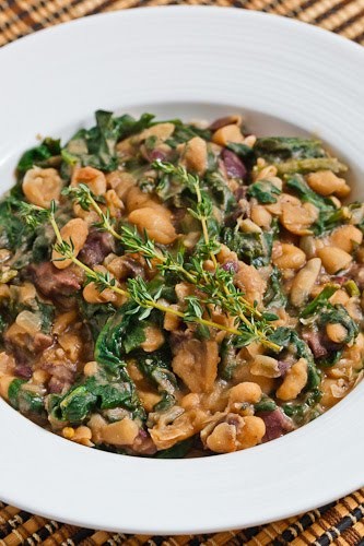 Mashed white beans with spinach and olives