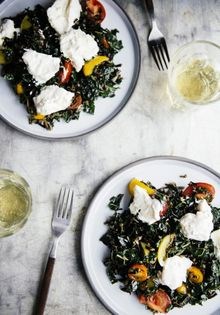 Massaged kale with tomatoes, creamed mozzarella, and wild rice