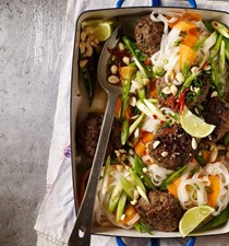 Massaman beef patties with noodles, lime and peanuts