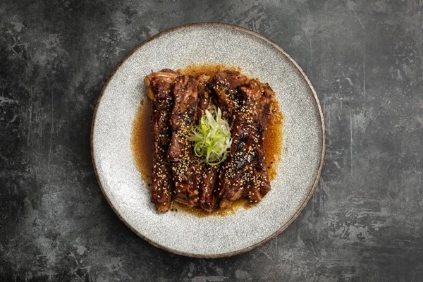 Master stock pork ribs with honey, soy and ginger dressing