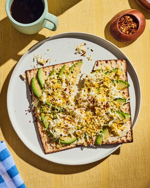 Matzo with avocado and grated egg