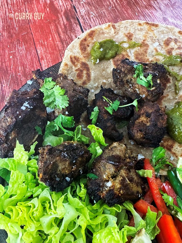 Meat tikka with cucumber raita