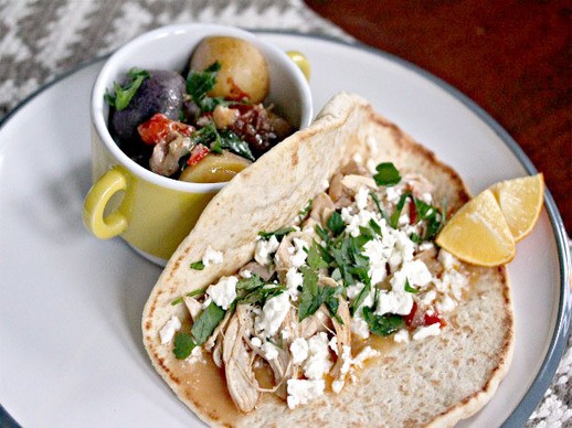 Mediterranean chicken, feta, and herb wrap with stewed potatoes