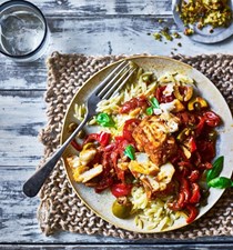Mediterranean cod with tomato and red peppers