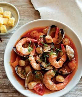 Mediterranean seafood stew with polenta cubes